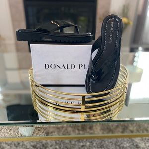 Donald Pliner black leather slides. Only worn once.